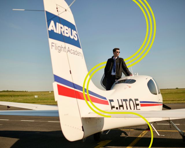 AFA - Cadet posing on Cirrus SR20 with stripes AFA - Cadet posing on Cirrus SR20 with stripes
