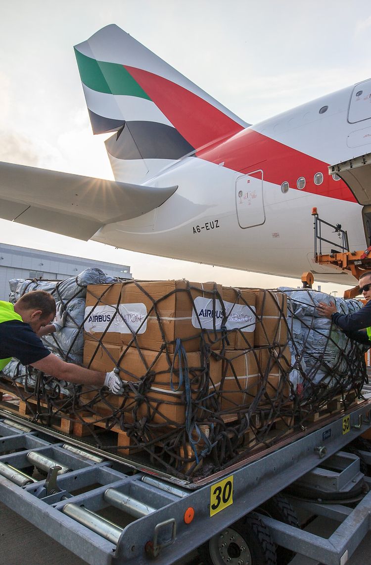 Emergency shelter items are loaded on board of an Emirates A380 flying from Hamburg to Dubai. Emergency shelter items are loaded on board of an Emirates A380 flying from Hamburg to Dubai.