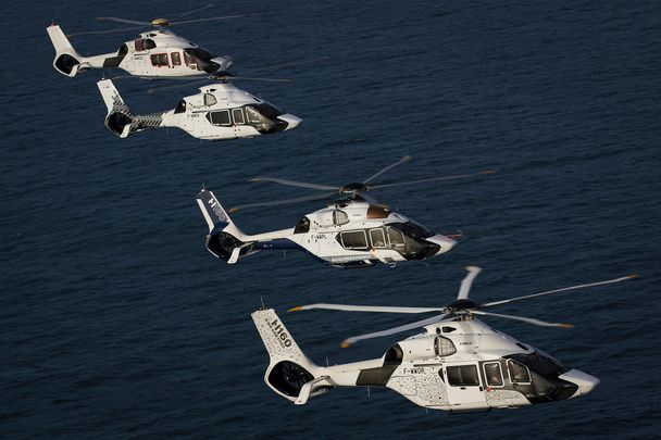 Four H160s in flight