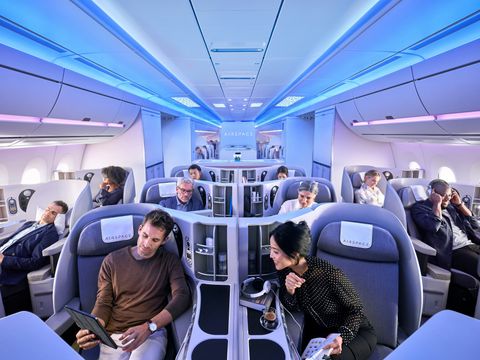 Passengers enjoying  Business Class in A350XWB Airspace cabin Passengers enjoying  Business Class in A350XWB Airspace cabin
