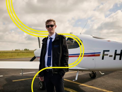 AFA - Male cadet in front of AFA aircraft with stripes AFA - Male cadet in front of AFA aircraft with stripes
