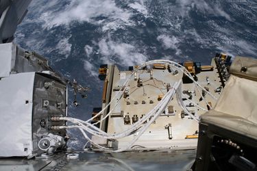 Bartolomeo and Colka during spacewalk Bartolomeo and Colka during spacewalk