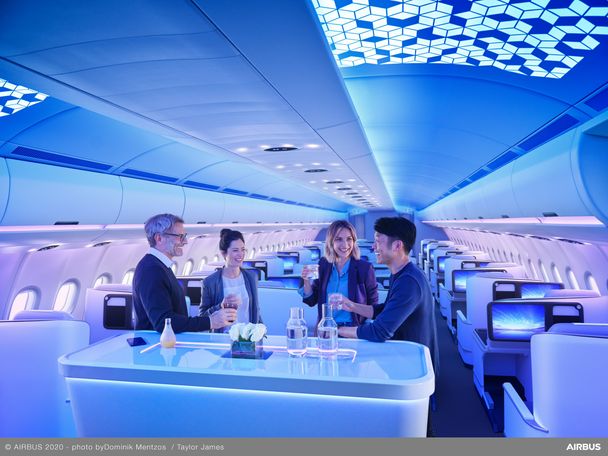 Passengers at the bar in Welcome area of A330neo Airspace cabin © AIRBUS 2020 - photo byDominik Mentzos / Taylor James