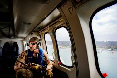 Air Center crew member in H225 cabin Air Center crew member in H225 cabin