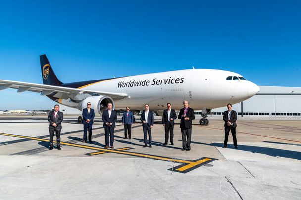 Group in front of A300 UPS Worlwide Services   