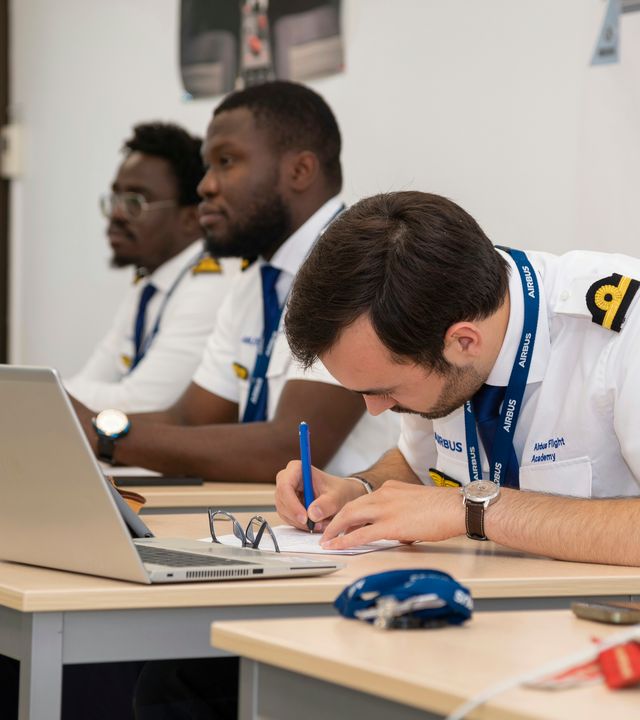 AFA - Cadets in a classroom 4 Cadets following a theoretical ATPL course in an Airbus Flight Academy Europe classroom