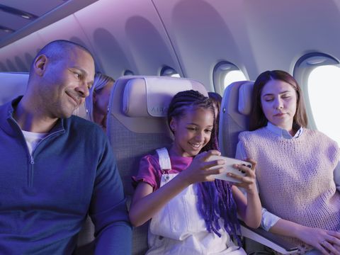 People enjoying their flight onboard the A330neo Airspace cabin. People enjoying their flight onboard the A330neo Airspace cabin.