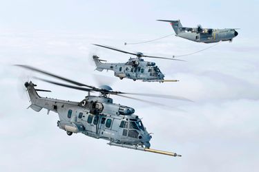 Airbus H225Ms and A400M in flight Airbus H225Ms and A400M in flight