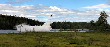 H125 Scandair helicopter sprays lime H125 Scandair helicopter sprays lime