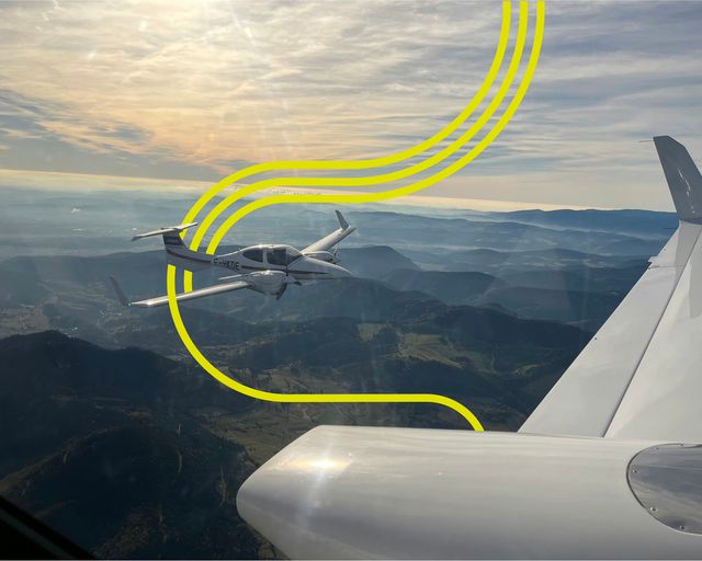 AFA - DA42 flying with stripes Airbus Flight Academy Diamond DA42 aircraft flying, picture taken from another aircraft
