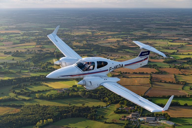 AFA - Diamond DA42 flying 1 A Diamond DA42 Airbus Flight Academy aircraft flying over Angoulême's region