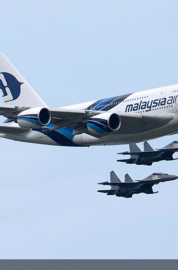 A380 MAS AND SUKHOI SU-30 IN FLIGHT A380 MAS AND SUKHOI SU-30 IN FLIGHT