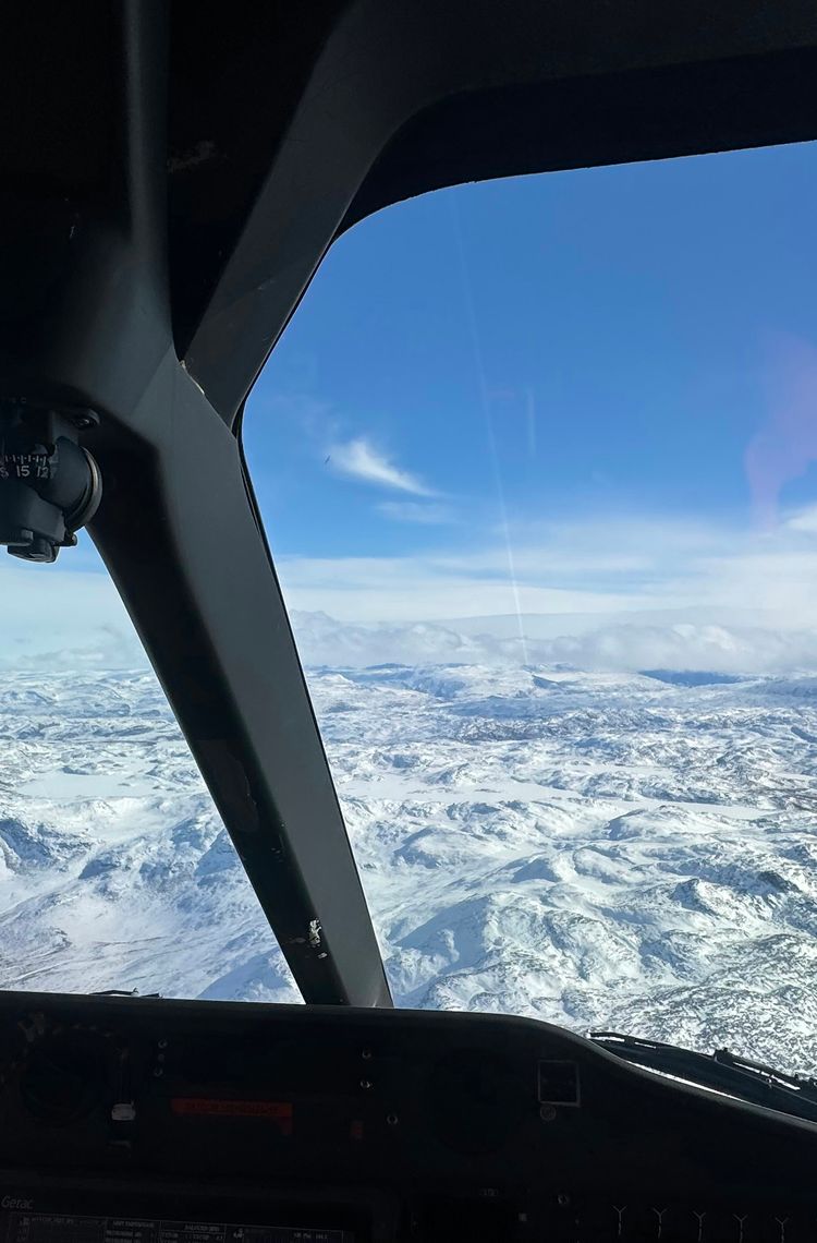 View of snow-capped landscape through H175 windshield View of snow-capped landscape through H175 windshield
