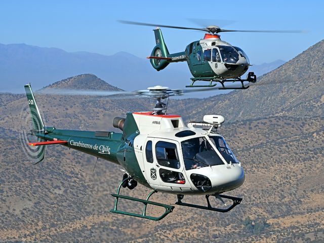 Carabineros' H125 and H135 in flight Carabineros' H125 and H135 in flight