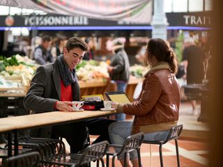 AFA - Cadets at the farmer's market Two cadets having a coffee in Angoulême farmer's market during their free time