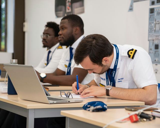 AFA - Cadets in a classroom 4 Cadets following a theoretical ATPL course in an Airbus Flight Academy Europe classroom