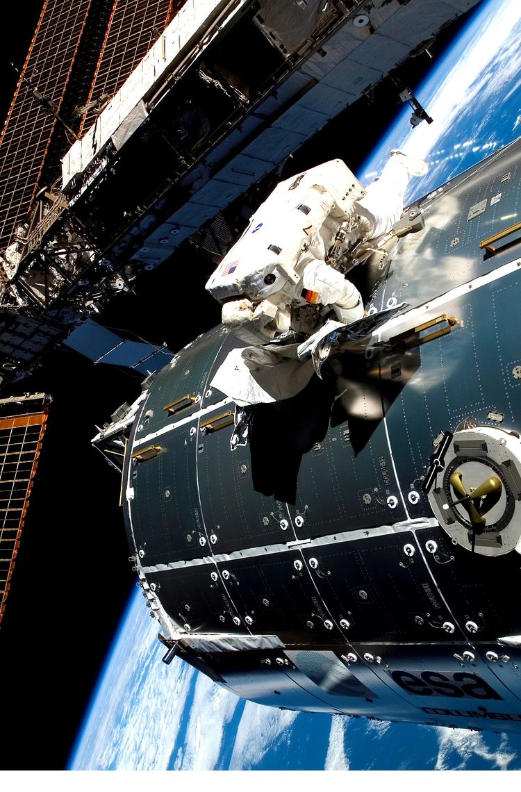 Astronaut works on Columbus Astronaut works on Columbus