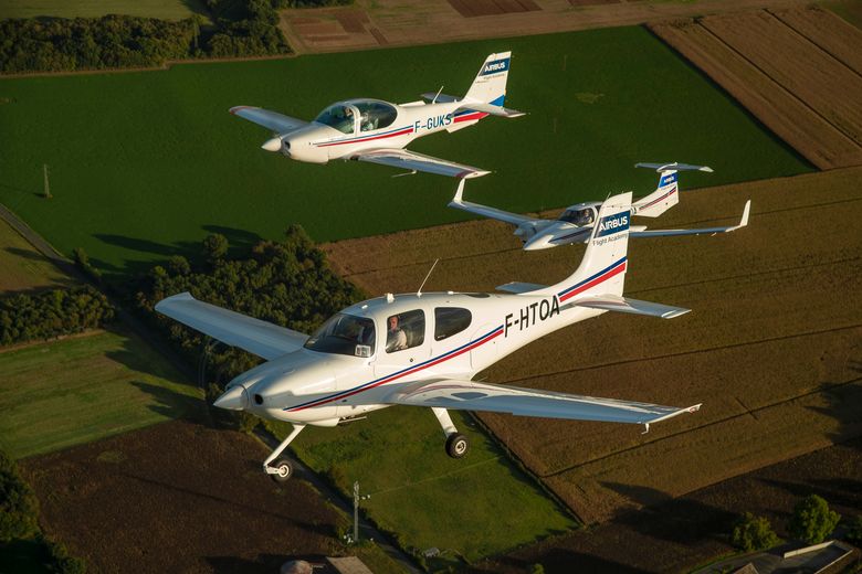 AFA - 3 aircraft in patrol flight A Cirrus SR20, a Grob G 120 and a Diamond DA42 Airbus Flight Academy aircraft in patrol flight