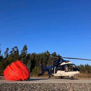 An Airbus Super Puma and water bucket An Airbus Super Puma and water bucket