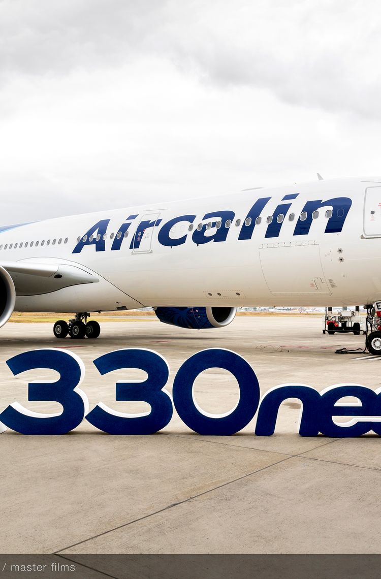 Letters in front of A330-900 Aircalin MSN1937 on ground Letters in front of A330-900 Aircalin MSN1937 on ground
