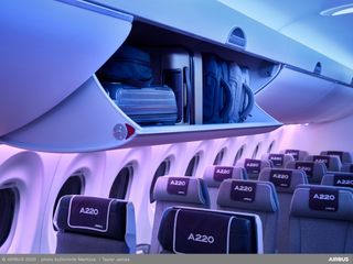 A220 Bins RHS, open with luggage A220 Bins RHS, open with luggage