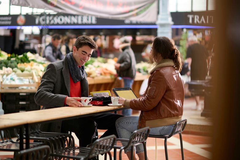 AFA - Cadets at the farmer's market Two cadets having a coffee in Angoulême farmer's market during their free time