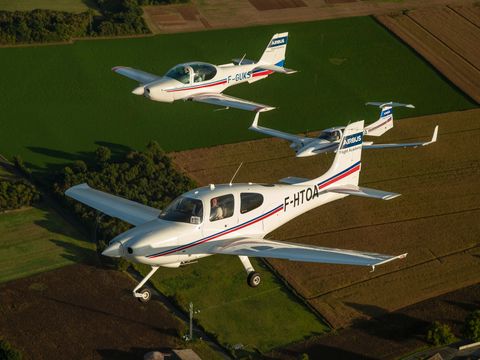 AFA - 3 aircraft in patrol flight A Cirrus SR20, a Grob G 120 and a Diamond DA42 Airbus Flight Academy aircraft in patrol flight