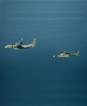 Air-to-air refuelling between C295W medium transports with a H225M Caracal helicopter