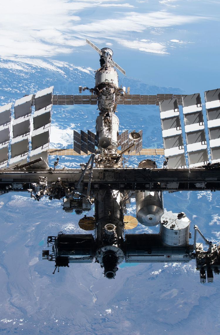 The space station is pictured from the spacex crew dragon The space station is pictured from the spacex crew dragon