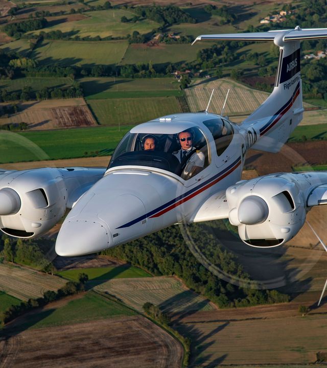AFA - Diamond DA42 flying 4 Diamond DA42 aircraft flying above Angoulême's countryside