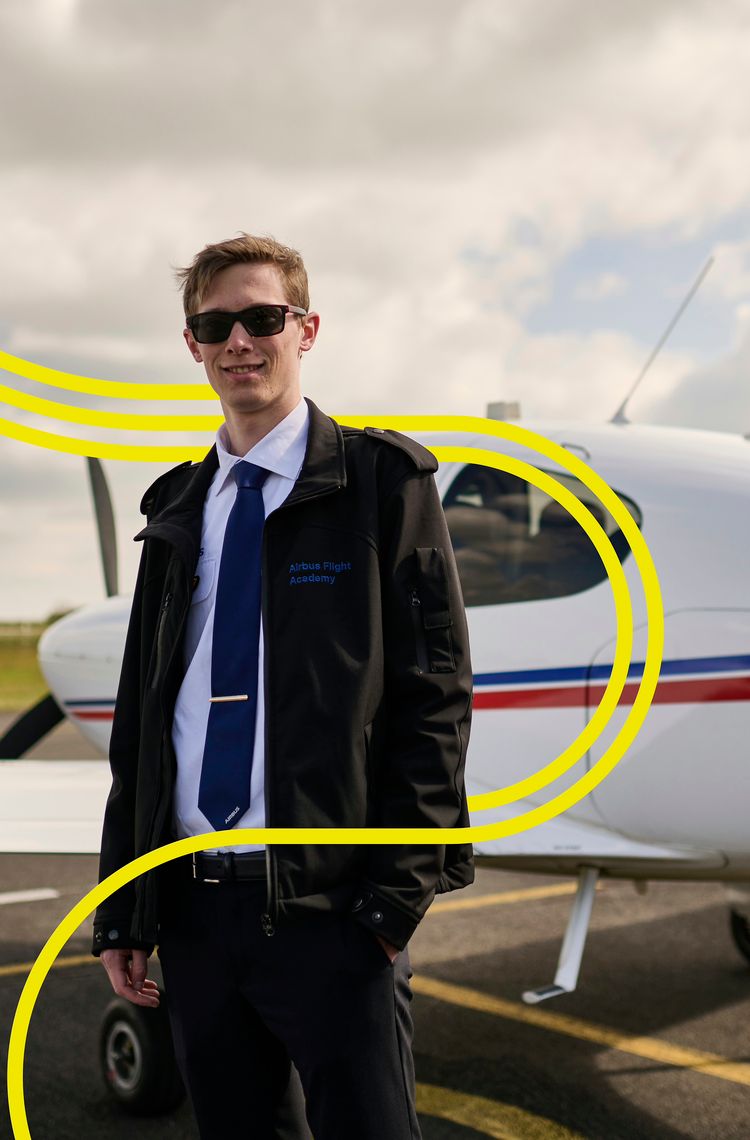 AFA - Male cadet in front of AFA aircraft with stripes AFA - Male cadet in front of AFA aircraft with stripes