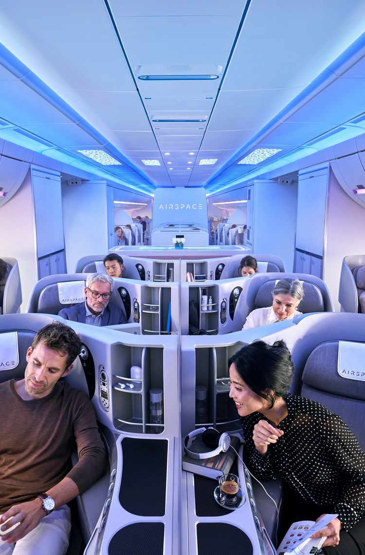 Passengers enjoying Business Class in A350XWB Airspace cabin Passengers enjoying Business Class in A350XWB Airspace cabin