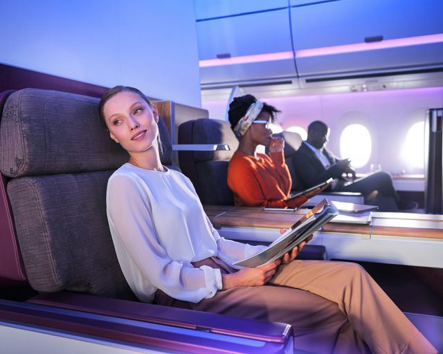 Passengers in A350XWB Airspace Business Class cabin Passengers in A350XWB Airspace Business Class cabin